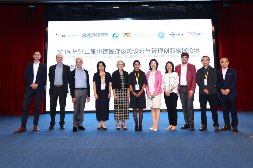 From left to right: Dominik Tschöp (Technical Director, Sinodeu Medical Co., Ltd. 韦氏（苏州）医疗科技有限公司), Ortwin Schulte (Permanent Representation of the Federal Republic of Germany to the European Union), Prof. Hans Nickl (Founder of Nickl & Partner Architekten), Prof. Chunyang Zhang (Architecture School, South China University of Technology), Prof. Christine Nickl-Weller (Chairwoman of the Managing Board, Nickl & Partner Architekten), Afra Khalifa (CEO and founder of Nickl Academy), Yun Chen (Director, Peking University Shenzhen Hospital), Hieronimus Nickl (Managing Director, Nickl & Partner Architekten and General Manager, Nickl & Partner Architectural Design Consulting Co. Ltd.), Limin Jiang (Architectural Design Research Institute (Group) Co., Ltd., Deputy Chief Architect, Tongji University, Healthcare Architecture, Academic Alliance of China, Association of Survey and Design of University Institutions) 